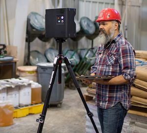 Arthur Earnest uses the Matterport camera system to capture the feed mill in 3D.