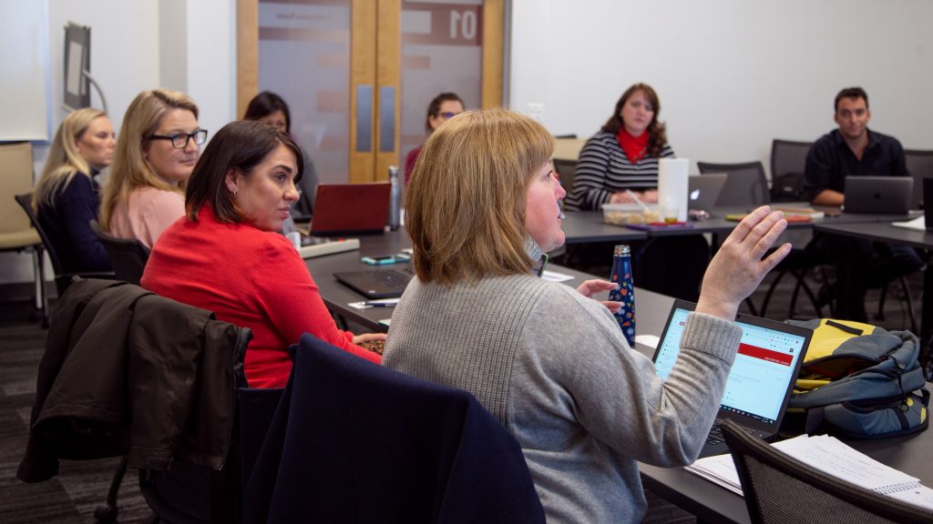Faculty and DELTA Staff in a work session about Course Quality