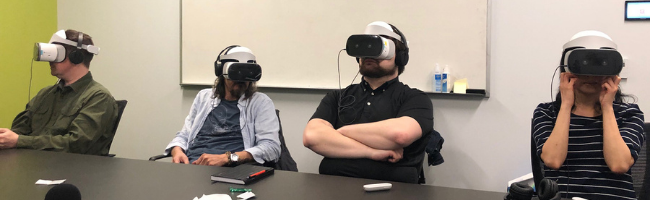 DELTA Staff wear VR Goggles.