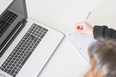 laptop with person studying